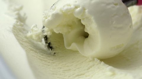 scooping vanilla ice cream close up (4K, HD, high definition 1080p).