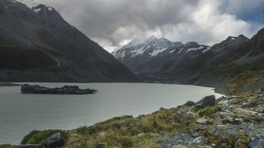 Time Lapse - Clouds moving at Mount Cook with Hooker Lake as foreground. Captured during rain, water droplets on lens.