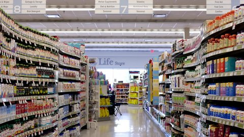 Coquitlam, BC, Canada - July 26, 2017 : Motion of display health foods section inside Shoppers drug mart store with 4k resolution