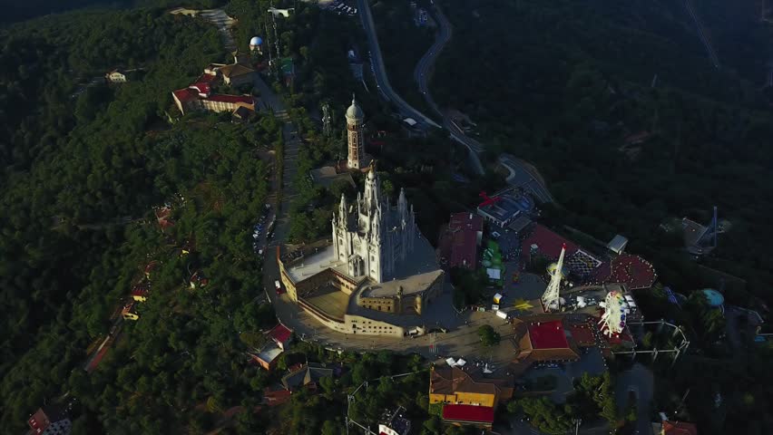A magical view on top of mount Tibidabo and the Church that stands on it | Shutterstock HD Video #29253133