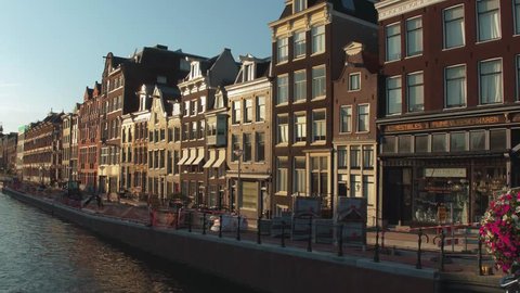 The beautiful buildings around the canals of Amsterdam - AMSTERDAM / NETHERLANDS - JULY 20, 2017