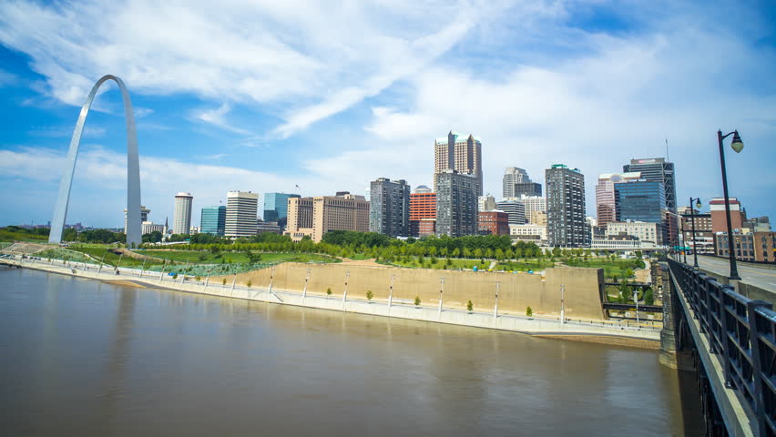 St louis time lapse of skyline and bridge with clouds 4k 1080p - time lapse of st louis missouri skyline with river and bridge and clouds rolling