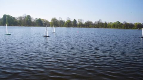 Miniature sailboats in London Park