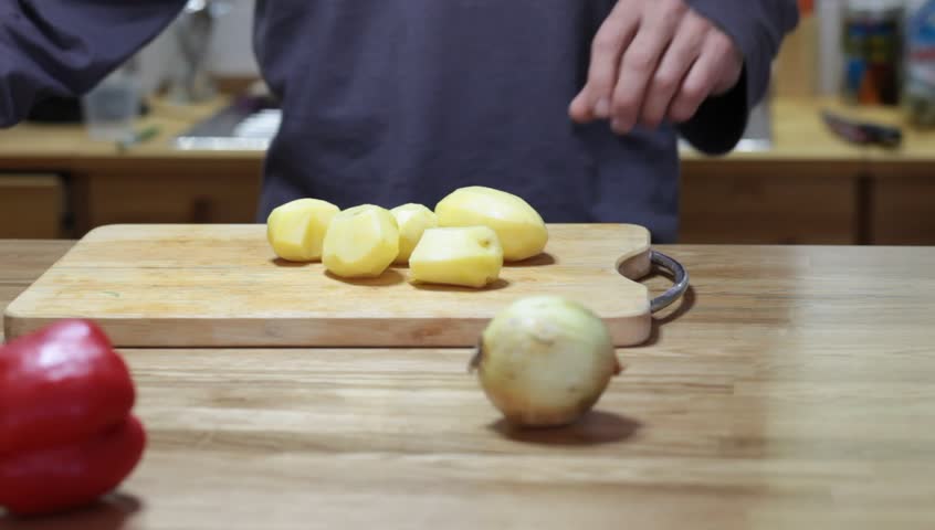Cutting  a potato