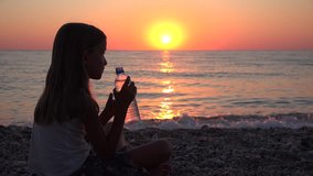 Child Portrait Drinking Water on Beach, Sunset View, Girl Face on Coastline 4K