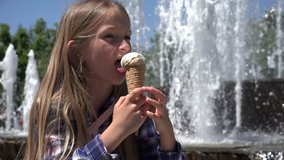 Child Eating Ice Cream Outdoor in Park, Girl Relaxing by a Fountain in Summer 4K