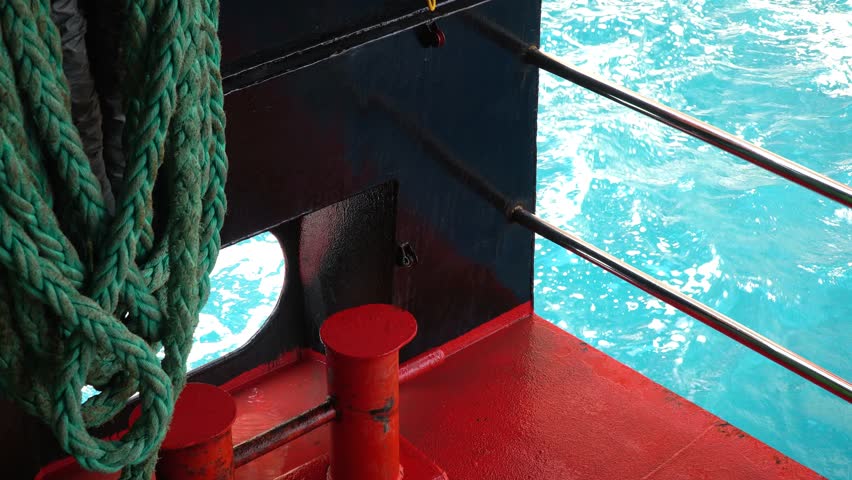 ship mooring. thick rope for mooring. on the background of blue sea