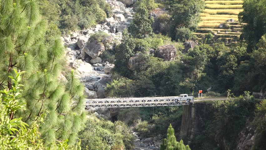 MONGAR, BHUTAN - MARCH 2016: Nature views with waterfall, pine forest  in Mongar, Bhutan.