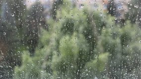 Rainy weather, raindrops on window