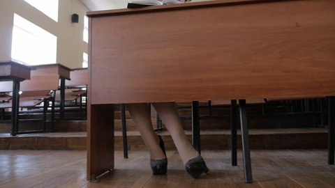 book under table leg