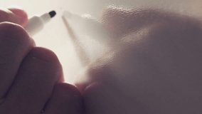 Mathematics teacher writing polynomial function math formula on classroom whiteboard with marker felt tip pen - Powered by Shutterstock - Get 15% off with code: PIKWIZARD15