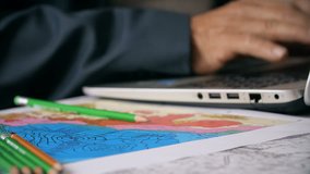 Business man typing on laptop consulting economical maps - Powered by Shutterstock - Get 15% off with code: PIKWIZARD15