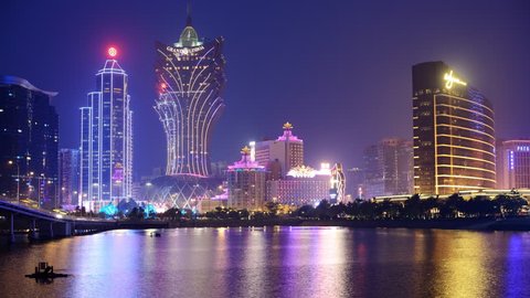 MACAU - OCTOBER 12: Skyline of resort casinos at Nam Van Lake October 12, 2012 in Macau, China. The city maintains the world's highest gambling revenue with over 20 million tourists annually.
