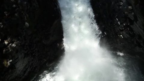 Duende waterfall jump in kayak in Ecuadorian rain forest. HD with audio.