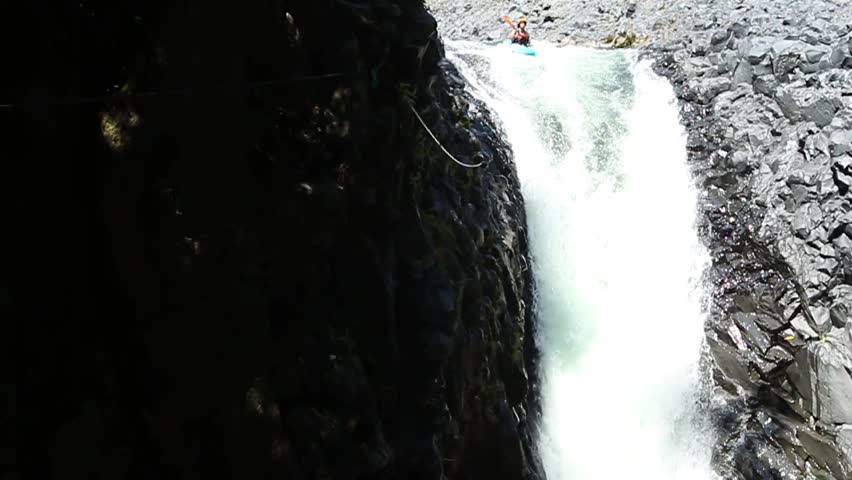 Duende waterfall jump in kayak in Ecuadorian rain forest. HD with audio.