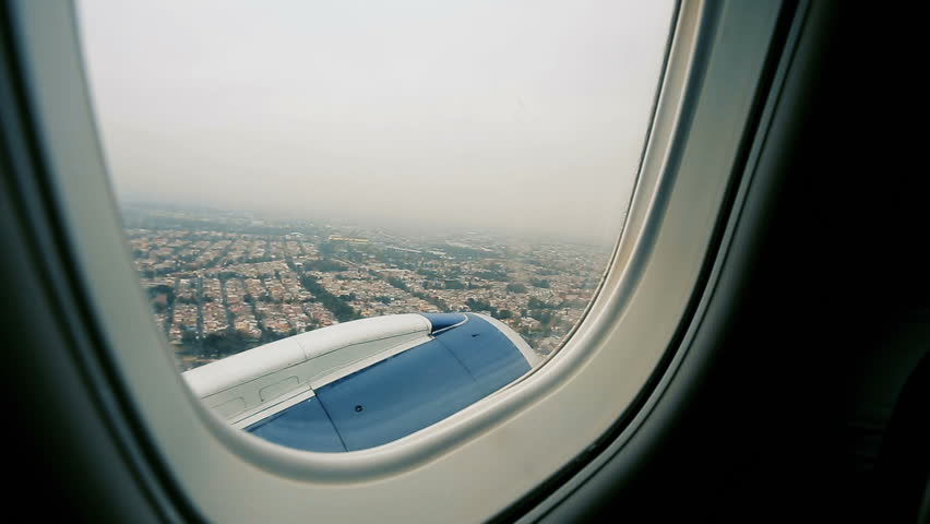 Looking Outside an Airplane Window Stock Footage Video (100% Royalty