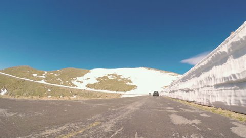 Denver, Colorado, USA-June 10, 2017.  POV point of view -  Driving on alpine road of Mount Evans in Early Summer.