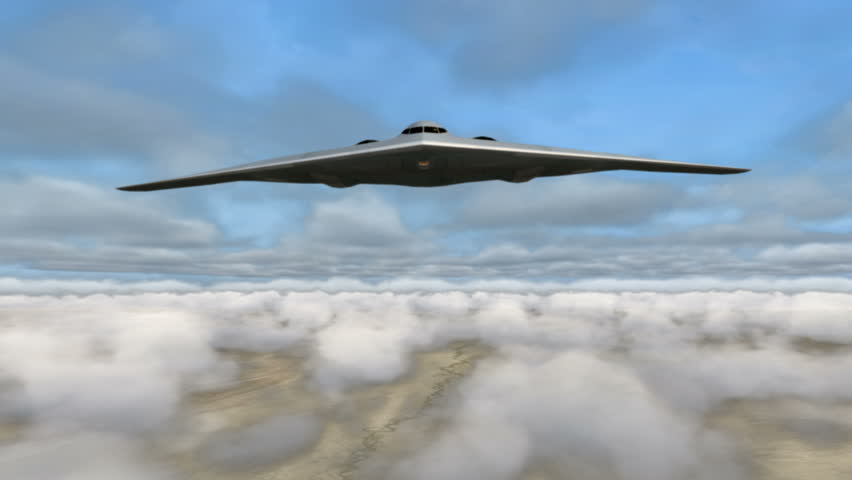 A B-2 Stealth Bomber flying above the clouds over the Middle East.