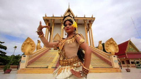 Apsara Dancer beautifully centered in front a temple
