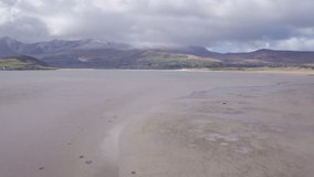 Aerial Footage Of Idyllic Mountains And Sea Against Cloudy Sky