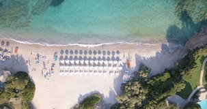 Video from above, aerial view of an amazing beach and turquoise sea in Sardinia, Italy