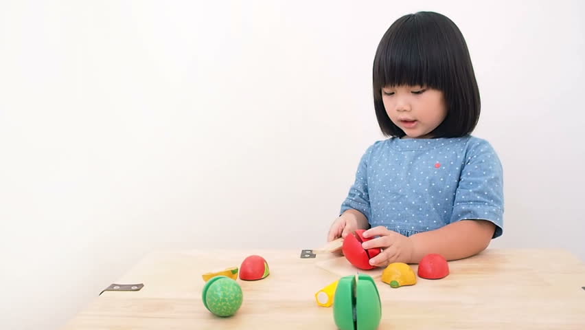 toddlers playing with toys