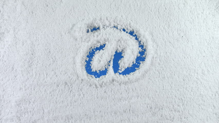 Email symbol drawn on snow background with matte