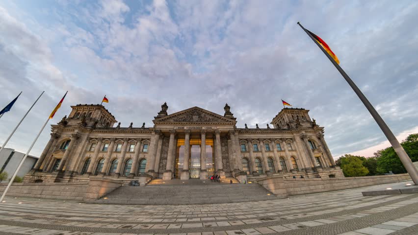 Berlin city skyline day to night timelapse at Reichstag (German Parliament Building), Berlin, Germany, 4K Time lapse