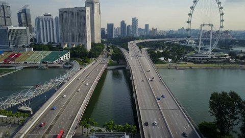 SINGAPORE - MAY 2017: Aerial view of highway and giant ferris wheel 'The Flyer' in Singapore
