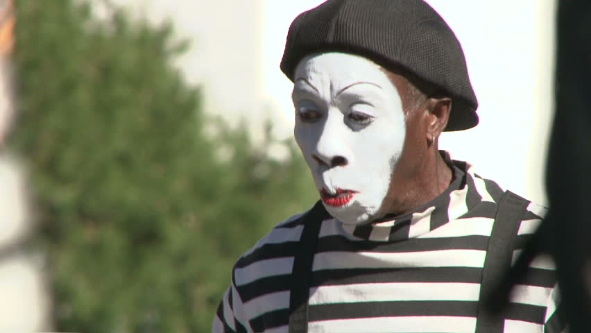LAS VEGAS, NEVADA - CIRCA 2012 - Street mime smiling and performing for tourists
