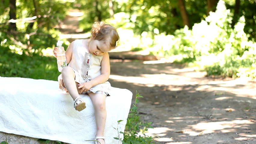 The child is bitten by mosquitoes and other insects during a walk in the forest.