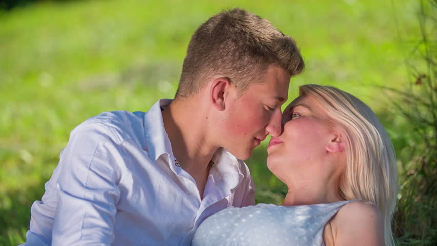 A Young Couple Is Kissing Stock Footage Video 100 Royaltyfree