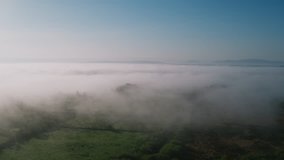 Aerial Drone Of Landscape Covered With Beautiful Clouds Against Sky