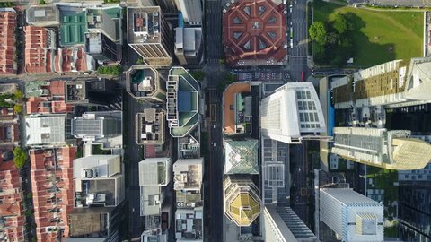 SINGAPORE - MAY 2017: Overhead aerial view of streets and skyscrapers in central business district Singapore, contrast with historic market building 