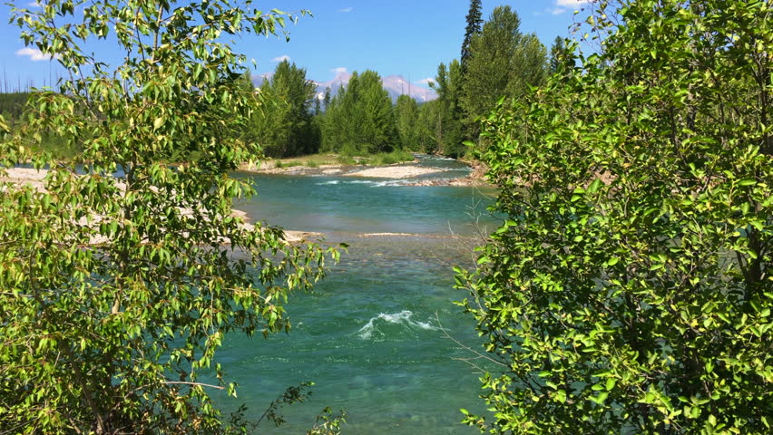 The stunning North Fork of the Flathead River in Glacier National Park in Polebridge, Montana on a clear summer day