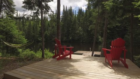 muskoka cottage chairs at river dock smooth approach gimbal