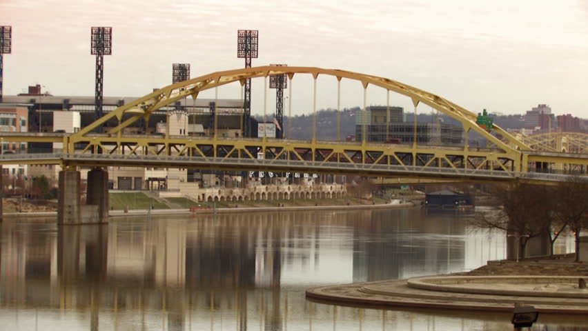 A time-lapse shot of traffic passing over the Fort Duquesne Bridge.