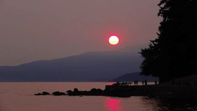 red sun and ocean views with smoke weather backgrounds,Vancouver BC Canada