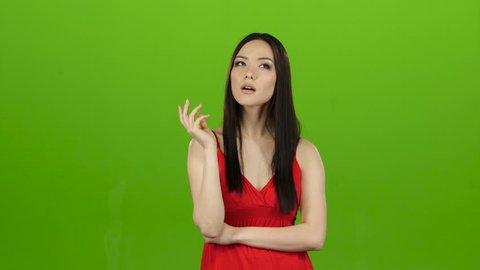 Asian thought about the meaning of life, pensive and focused. Green screen