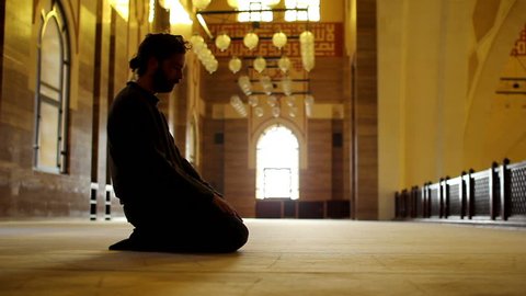 muslim man worship inside mosque