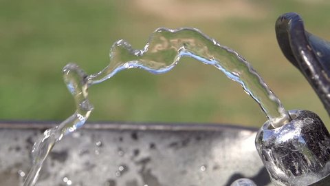 Park water fountain stream slow motion