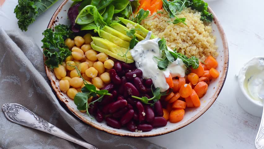 Vegan Buddha bowl with quinoa and chickpea | Shutterstock HD Video #29431819