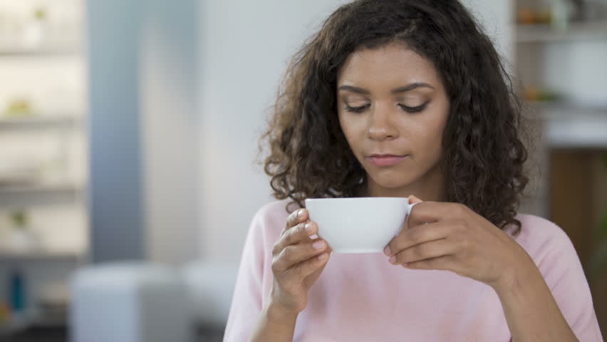 Pretty Mixed Race Woman Drinking Stock Footage Video (100% Royalty-free)  29438221 | Shutterstock