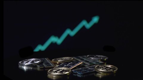 Bitcoin cryptocurrency BTC and computer components rotating in front of growth graph animated background
