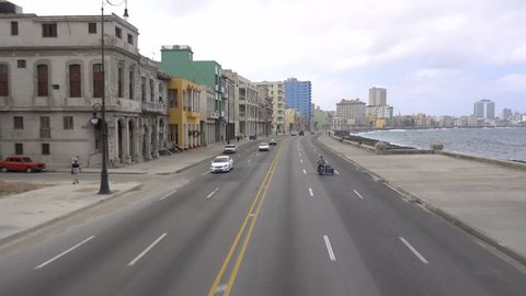 HAVANA, CUBA - FEBRUARY 2017: Steadicam shot driving over iconic Malecon in Havana, Cuba