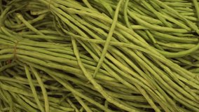 Green string beans and radish sold in the supermarket stock footage video