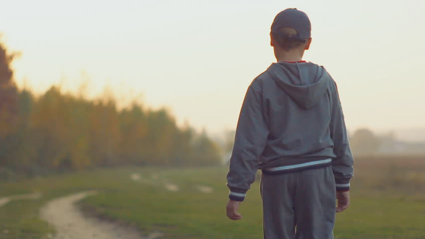 boy is on the road, evening , family vacation