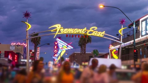 Tourists on Fremont street in Las Vegas, Nevada at night, timelapse (people blurred for commercial use)