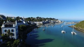Flying over the famous village of Sauzon and its colourful port, located on the north coast of the island of Belle-ile-en-Mer, the largest of Morbihan islands, Brittany, France. 
