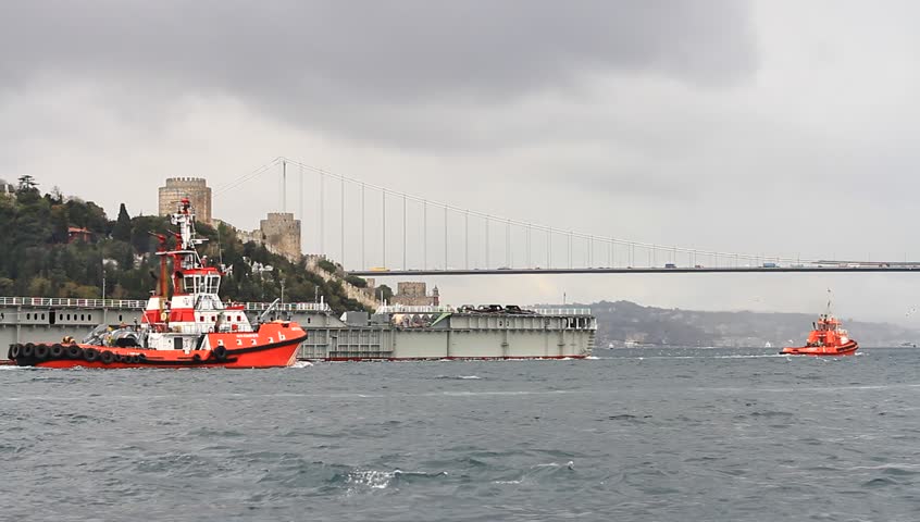 ISTANBUL - OCT 20: Towing Operation in Bosporus Sea on October 20, 2012 in